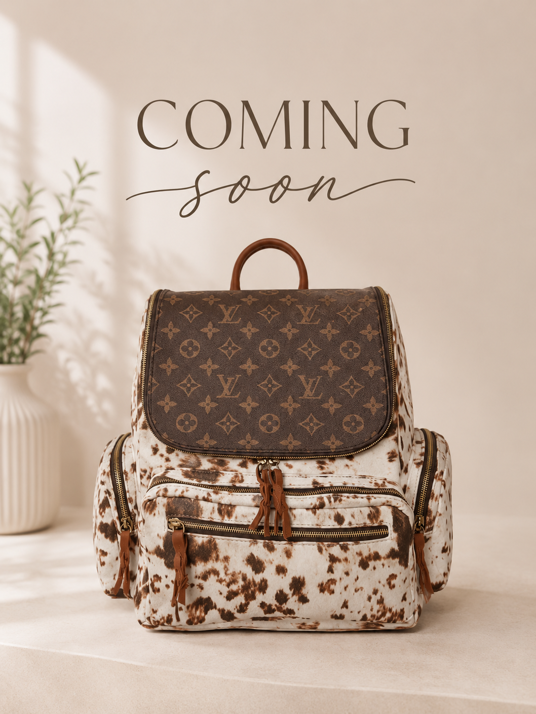 Upcycled Monogram Cowhide Print Backpack